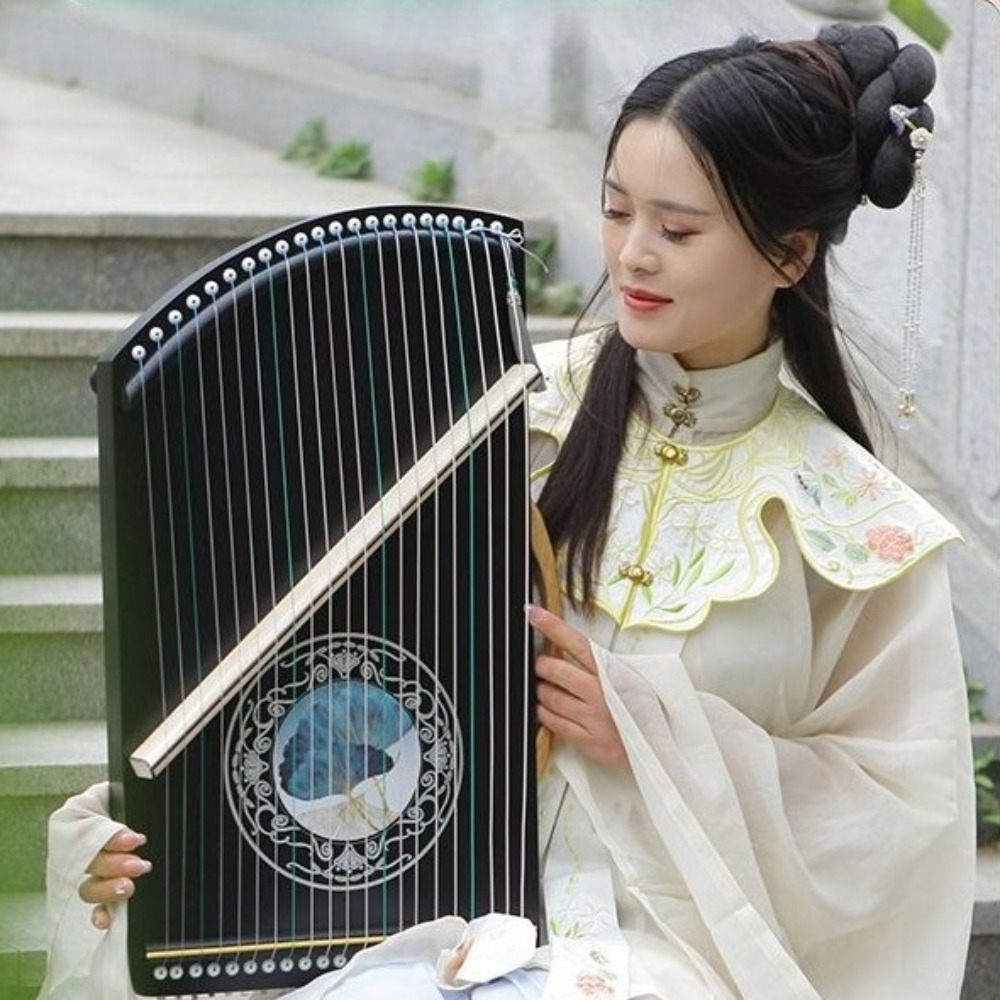 Mini Guzheng professionale a 2 - Musical Instrument Guzheng recensione e prezzo